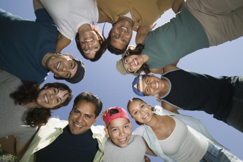 Image of youth in a circle from below. 