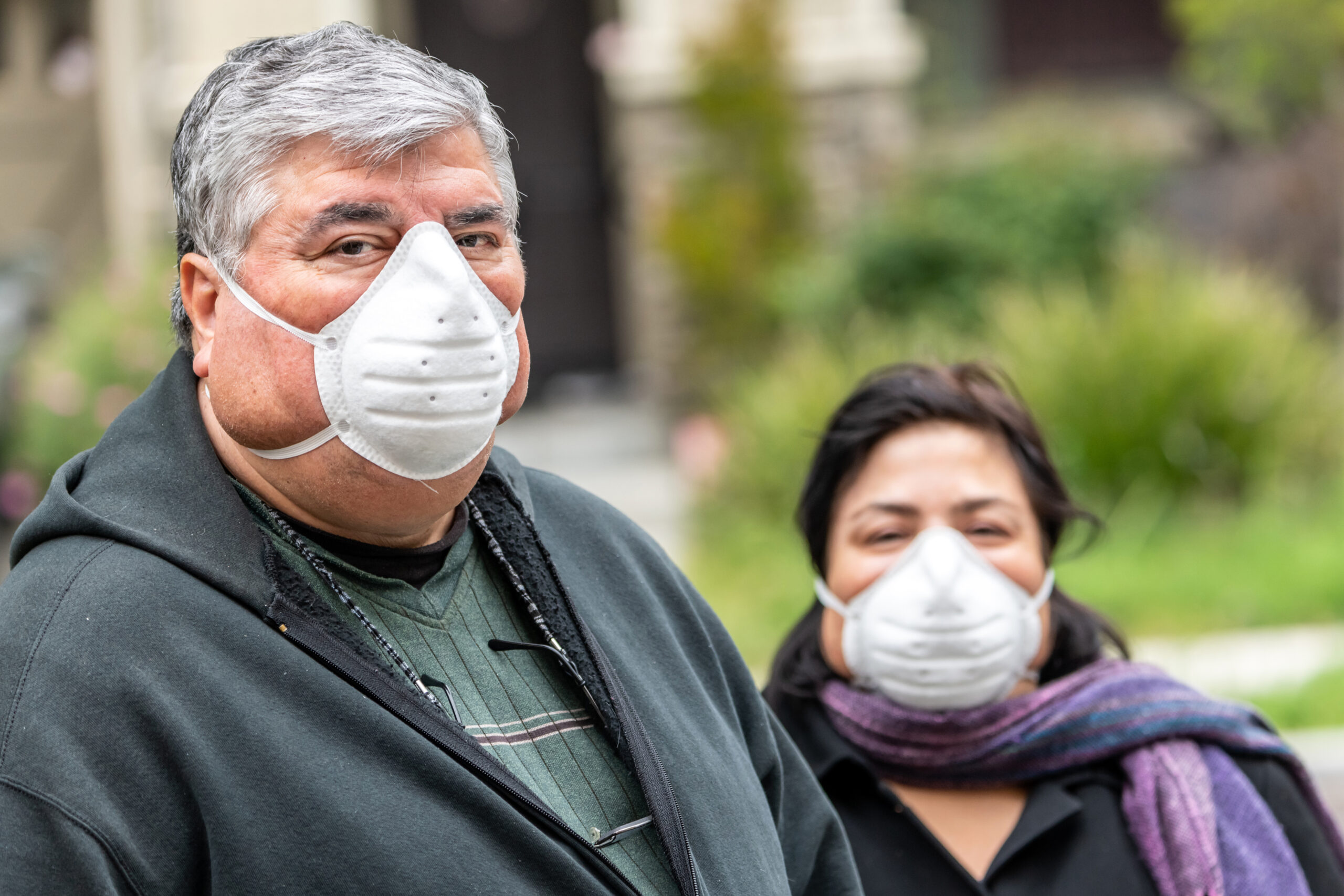 picture of older couple with facemasks